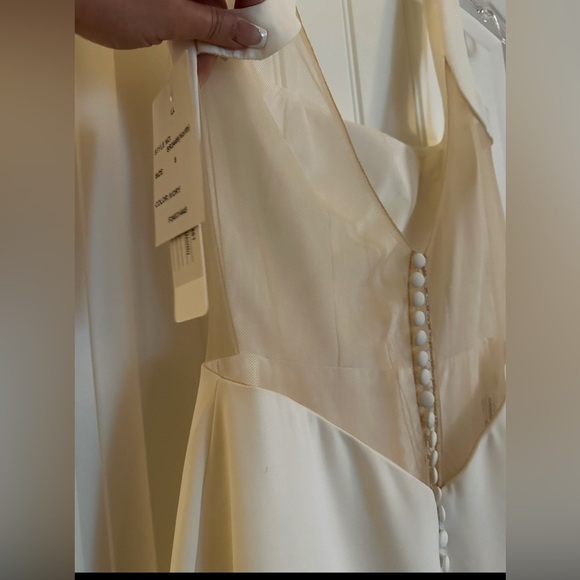 Chic Ivory Bridal Gown with Button Detail - Picture 9 of 12